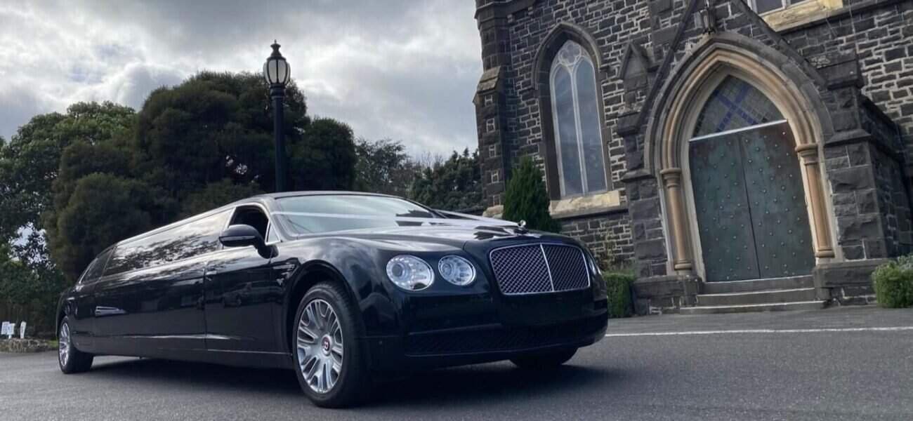 Luxury black limousine ready for special events or airport transfers.