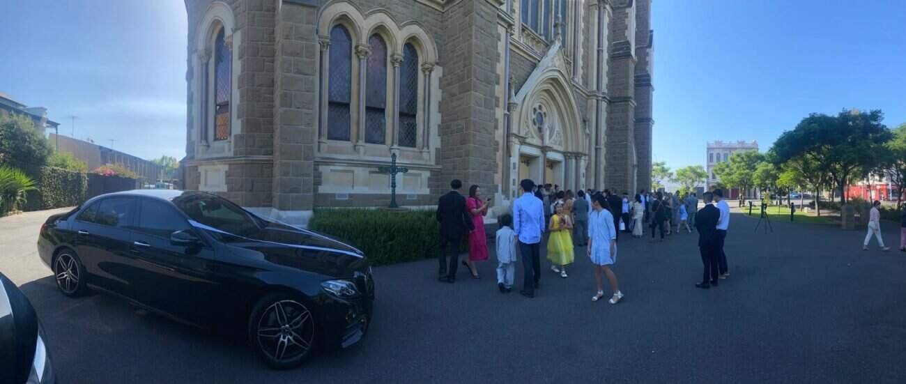 Group of people arriving at church for service, transportation provided by DriveToArrive.